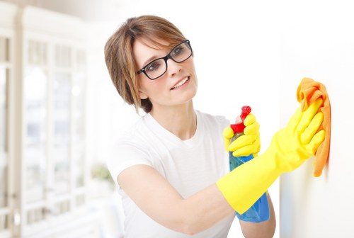 Carpet cleaning team preparing equipment safely before work begins
